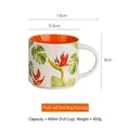 Orange ceramic 450ml flower and bird mug with monstera leaf and bird of paradise print - Orange