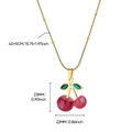 Détail du pendentif cerise rouge à effet pailleté et feuille verte sur chaîne dorée - Pendentif Cerise Ronde Rouge à Paillettes (G3057339G-1)