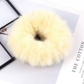 Minimalist beige plush scrunchie made of soft faux fur for elegant hairstyles - Beige