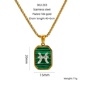 Détails du collier en acier doré 18k avec pendentif malachite poissons et mesures - Poissons