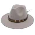 Detail of grey wool fedora hat featuring a brown leather band with shells and metal beads - Light Gray