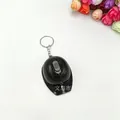 Miniature black safety helmet keychain with integrated LED light and silver metal ring - Black
