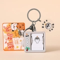 Cartoon gray seal flipping book keychain with orange packaging and acrylic charm - Grey Flip-Book Seal