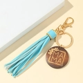 Portachiavi con nappa in pelle PU con ciondolo in legno MAMA e finiture dorate - Celeste