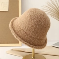 Plush beige faux mink fur bucket hat for winter displayed on a golden metal stand - Khaki