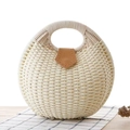 Handwoven straw seashell handbag with round handles and brown leather buckle detail - White