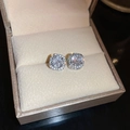 Macro view of square halo cubic zirconia stud earrings in a beige velvet jewelry box - S925 Silver Pin Square Halo Style / Silver
