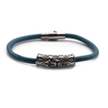 Detailed close-up of peacock blue leather bracelet with engraved cross metal charm - Platinum U