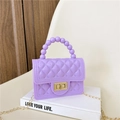 Mini purple PVC jelly bag featuring diamond texture, pearl handle, and golden chain strap - Purple