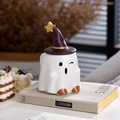 Detail of cute ghost ceramic mug with a purple wizard hat lid and golden star accent - 16oz / Winking Ghost (With Witch Hat Lid)
