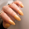 Glossy mustard yellow almond shaped press-on nails with shiny finish and gold rings - Apricot Yellow