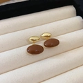 Elegant gold oval stud earrings with reddish-brown enamel inlay in a jewelry box - No.9 Dark Coffee Oval Stud Earrings (S925 Pin)