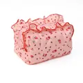 Pink floral quilted cosmetic bag with ruffled edges and brown bow patterns for travel - Pink Floral Lace Bag
