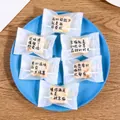 Frosted white nougat bags with black quotes in a blue plate, 5.5x8.5 cm size variant - Classic Quotes (6-in-1) / 5.5*8.5cm (100 Pieces/Pack)
