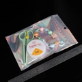 Laser film zip bag with DIY bead kit set, green scissors, and 0.6mm elastic string cord - Large