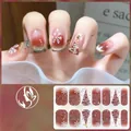 Detailed Christmas nail decals set featuring red gradient, gold stars, and snowflake patterns - CS427