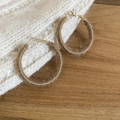Detail of flocking round hoop earrings with brown wool texture and gold clasps - Light Coffee