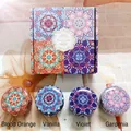 Set of four soy wax scented candles in colorful mandala tins with blood orange and vanilla - Style A (Blood Orange/Vanilla/Violet/Gardenia)