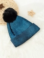 Detail of bright blue metallic knit beanie with a plush black faux fur pom-pom topper - One Size / Lake Blue