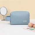 Light blue quilted leather cosmetic bag with a handle and zipper for travel storage - Casual Pillow Shape Organizer (X-218) / Blue