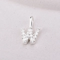 Sterling silver letter W pendant necklace with clear crystals on a textured surface - Letter W / Silver