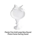 White plaster jewelry display with oval frame and elegant large bow knot detail - Gypsum Fine Grid Large Bowknot Round Earring Stand