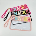 Detail of transparent PVC snack pouches with glitter SNACKS letters and wrist straps - With Wrist Strap