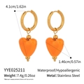 Detail view of orange heart earrings with size measurements and stainless steel material info - Gold Hoop Orange Heart Style (YYE025211)