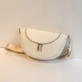 Beige crescent crossbody bag in lychee texture leather with a wide nylon strap - Off White