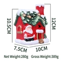 Casetta di Natale in ceramica con Babbo Natale e tetto verde, altezza 12 cm - Babbo Natale