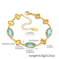 Bracciale a cuore in acciaio dorato con vetro marquise blu e dettagli sulle misure - Oro Blu