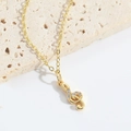 Elegant gold necklace with a G-clef pendant featuring sparkling white cubic zirconia - Treble Clef XL3262-7