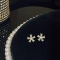 Elegant gold flower stud earrings with sparkling clear zircons on black velvet background - A913 Gold-Flower Shape