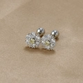 Detailed view of the S925 silver flower stud earring with screw back and yellow zircon - Silver-White
