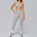Women's light grey yoga set with racerback sports bra and high-waisted leggings - S / Top And Bottom / White Brown