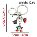 Christmas keychain with Santa star, tree and hat charms, alloy metal bag pendant 12.6g - ER1786-Star Santa Hat Tree 8-shape Keychain