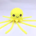 Bright yellow silicone octopus bath toy with cute smiley face and soft tentacles - New Expression Yellow Octopus