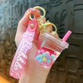 Portachiavi tazza di bubble tea rosa con liquido glitterato e perline colorate - Rosa