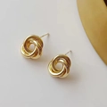 Minimalist trinity knot stud earrings in 18K gold finish with polished metallic texture - Gold Knot