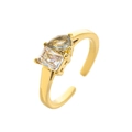 Adjustable golden titanium steel ring with square and pear-shaped clear zircon stones - Open Size 7 / April