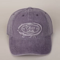 Close-up of vintage washed purple cotton baseball cap with embroidered letter patch - Purple