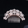 Detailed view of rose gold flower hair comb with shimmering rhinestones and pearls - Style 4 / Rose Gold
