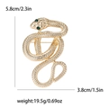 Spilla a forma di serpente dorata retrò con occhi in cristallo verde e squame materiche - Oro