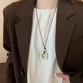 Close-up of vintage star pendant necklace with marble ring on a black cord - 16# Necklace - White/Silver - Marble Texture Ring