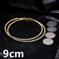 Golden oversized 9cm crystal hoop earrings with rhinestones on black silk background - Gold 9cm