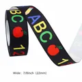 Schwarzes 22mm Ripsband mit ABC 123 Mustern sowie bunten Apfel- und Bleistiftdrucken - Nr. 1 Schwarz ABC Apfel Bleistift / Größe 5