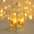 Close-up of white vintage Christmas lantern with Santa Claus and warm LED light effect - Santa Claus / White