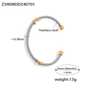 Dettaglio del bracciale a cavo in acciaio inossidabile argento con foglie dorate - Oro