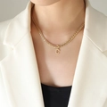 Golden letter C pendant necklace with zircon stones on a woven twisted chain - Letter C / Gold