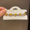 Detailed shot of French style bracelet with alternating yellow and white crystals - 46# Bracelet - Silver - Yellow
